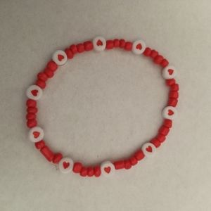 Hand Crafted Red stretchy beaded heart logo Statement love bracelet